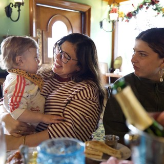 Three Generations Sharing a Joyful Holiday Meal