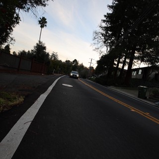 Twilight Road Through Residential Canyon Hills
