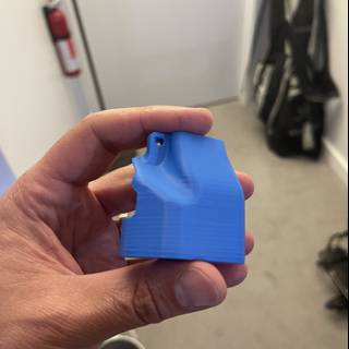 Blue Plastic Object for Cleaning