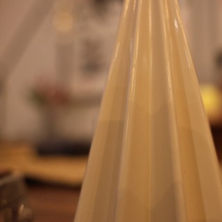 Elegant Ceramic Cone in Warm Holiday Ambiance