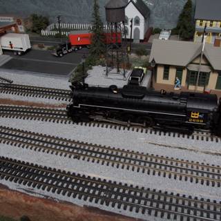 Model Train Passing Through a Quaint Town
