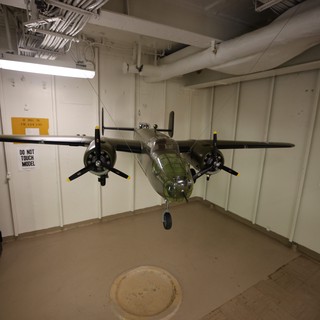 Vintage Military Aircraft Model Suspended in USS Hornet Museum