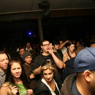 Partygoers Celebrate in Urban Nightclub