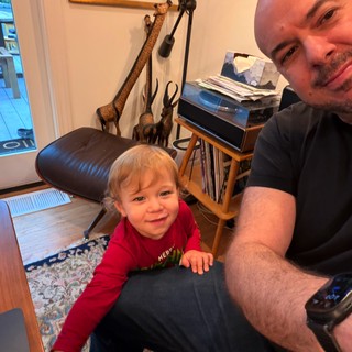 Father and Child Gaming Together at Home