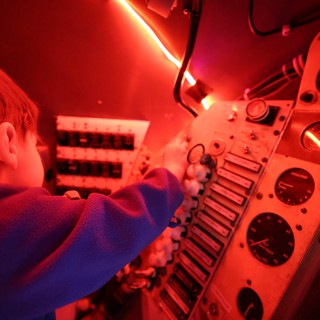 Inside the Submarine: Red-Lit Control Panel Experience