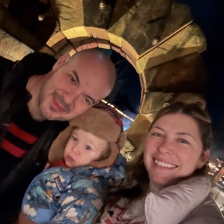 Family Christmas Portrait Looking Up at Tree