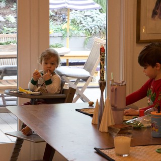 Children's Mealtime in Modern Kitchen During Christmas