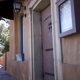 Historic Adobe Building Entrance with Ornate Details