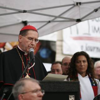 Bishop Roger Mahony delivers an electrifying speech at a rally