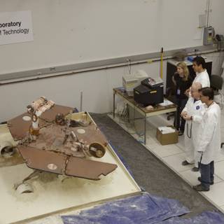 Hospital Lab Team Inspecting Mars Rover