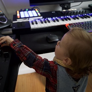 Young Child at Music Production Workstation
