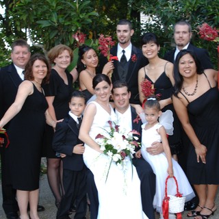 Joyful Wedding Party Celebration in Garden Setting