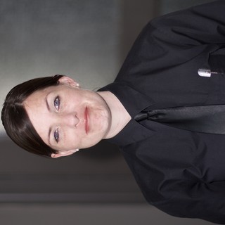Professional Woman in Black Uniform Portrait