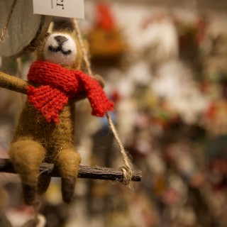 Felted Sloth Ornament with Red Scarf on Swing