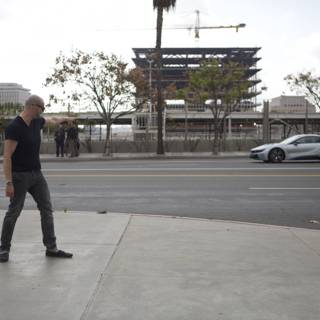 Man Standing on Urban Street
