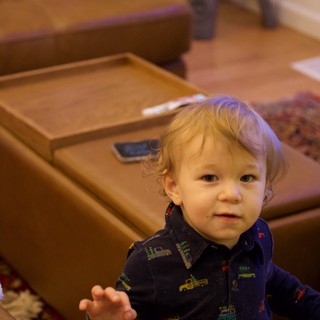 Toddler in Train Pajamas at Christmas Gathering