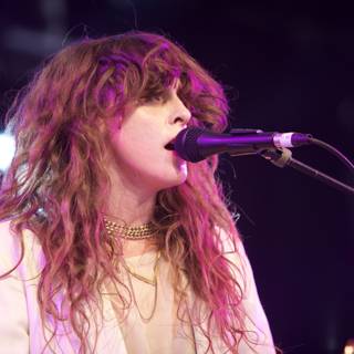 Victoria Legrand's Electrifying Microphone Performance