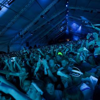 Blue-Lit Crowd at Coachella Concert