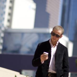 Businessman Checking His Phone