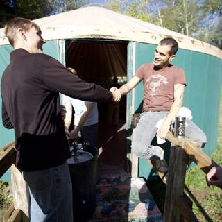Handshake in Front of a Yurt
