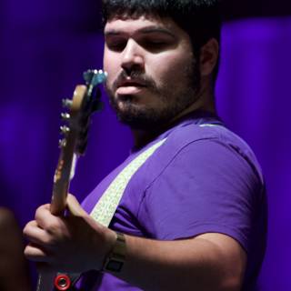 Purple Shirt Guitarist