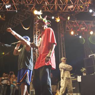 Two Men Take the Stage with Microphones at Coachella 2009