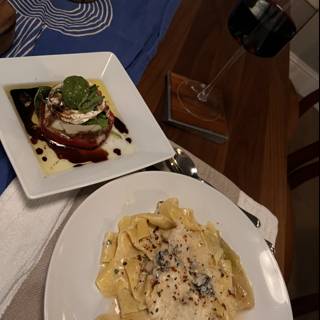 A Delicious Plate of Pasta and Wine
