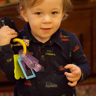 Toddler with Toy Keys on Christmas Morning