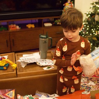 Christmas Morning Gift Unwrapping at Home