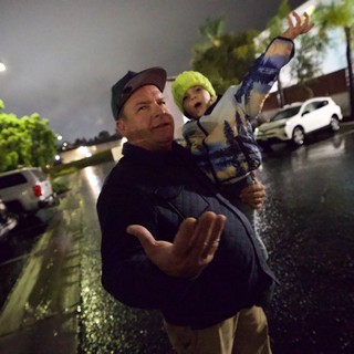 Father and Child Rescued During Nighttime Flood Emergency