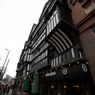Historic Tudor-Style Building in London at Dusk