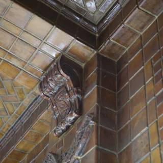 Corner of Building Adorned with Brown Tiles