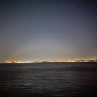 Skyline at Night with Rainbow over San Francisco Bay