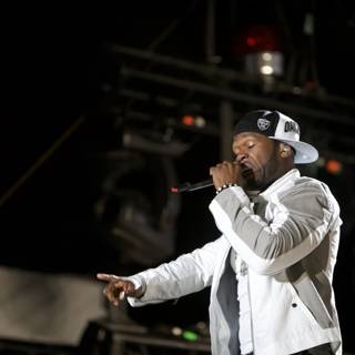 50 Cent Rocks the Stage in a White Jacket and Hat