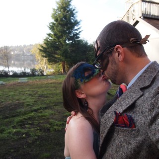 Masked Kiss at Lakeside Masquerade Party