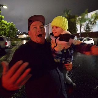 Father and Child Caught in Moment of Surprise