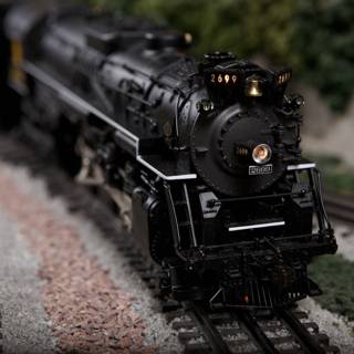 Black Locomotive on Railroad Track