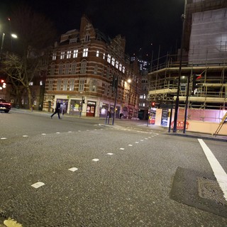 Victorian Corner Building Illuminated at Night in London
