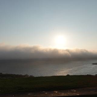 A beautiful sunrise over the foggy California coast