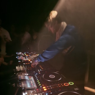 DJ Performance in Atmospheric London Club