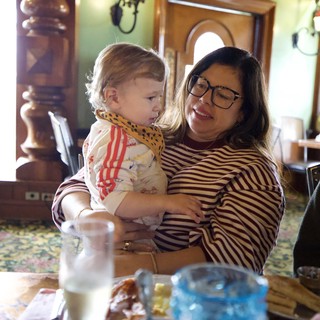 Grandmother and Grandchild Share Tender Moment at Family Gathering