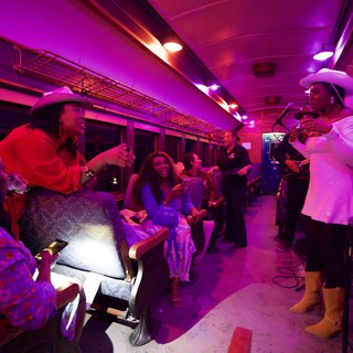 Theatrical Performance on Vintage Train Car Interior