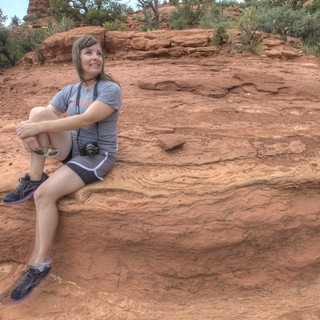Hiker Resting on Red Rock Formations in Sedona