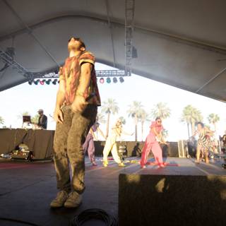 Man performing on stage at Coachella 2008