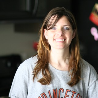 Smiling Woman in Princeton Sweatshirt at Home