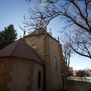 Historic Chapel with Bare Winter Trees in Santa Fe