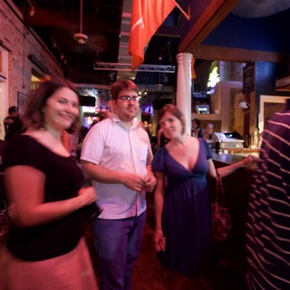 Friends Socializing at a Lively Austin Bar