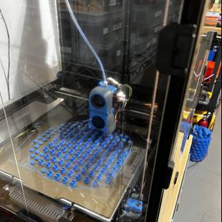 State-of-the-Art 3D Printer with Blue and Red Parts