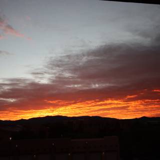 Fiery Sunset Over Mountain Ranges