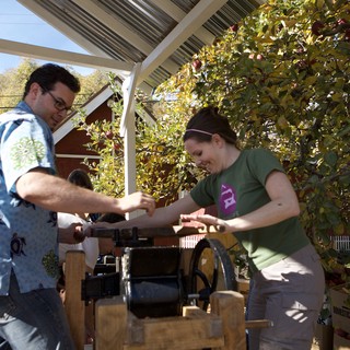 Making Fresh Apple Cider at an Autumn Farm